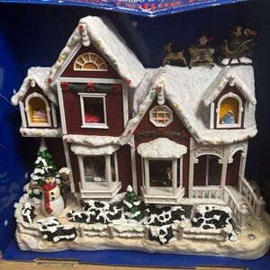 Festive Holiday Village House with Santa and Snowman